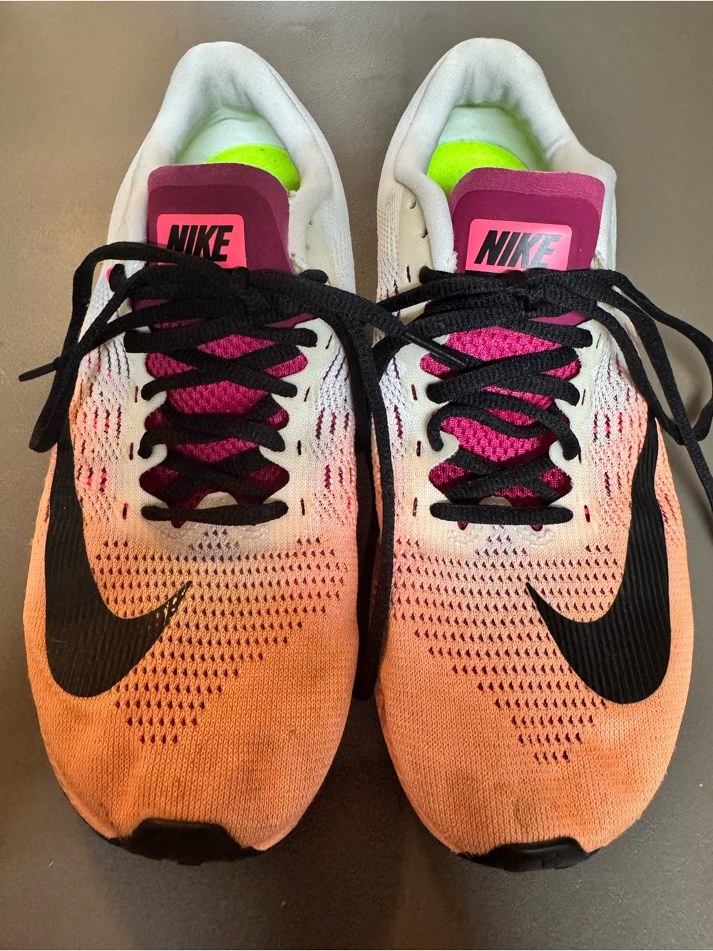 Nike Womenâs Gradient Running Shoes in Pink and Orange with Black Swoosh